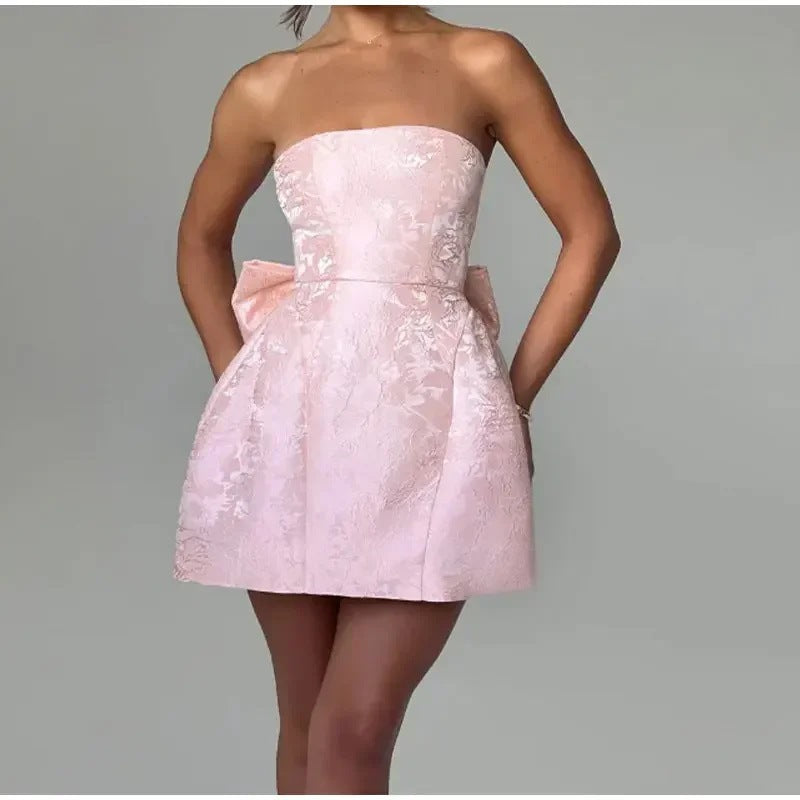 Chic Strapless Mini Dress with Bow Back Detail