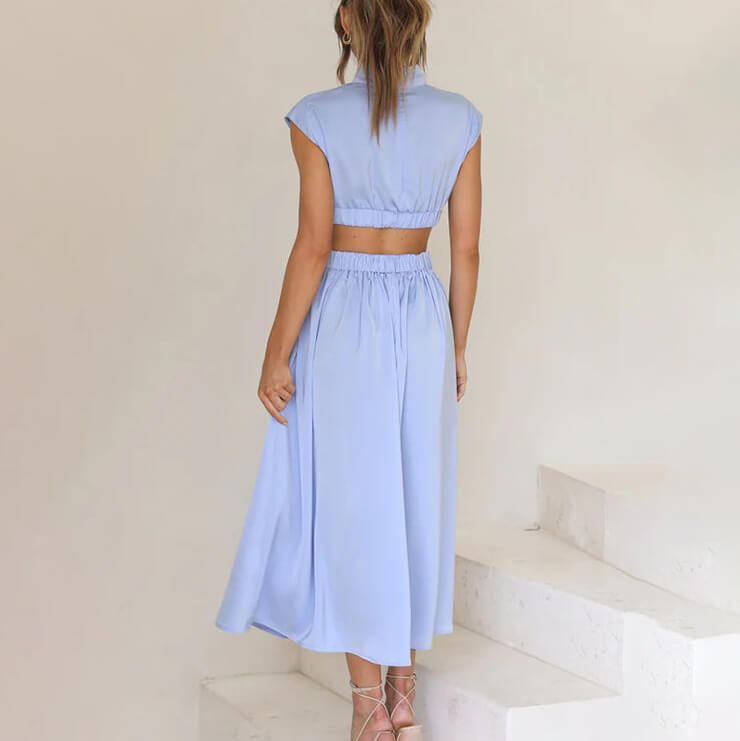 Chic Midi Dress with Cut-Out Waist and Flared Skirt