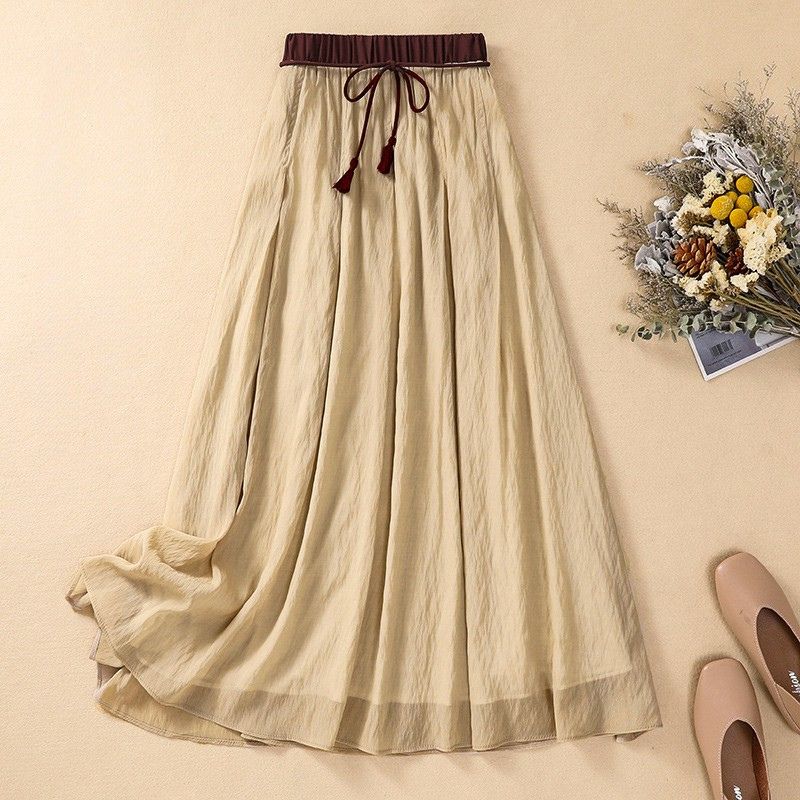 Flowy Long Skirt with Embellished Waist and Fringe Trim - Nocini