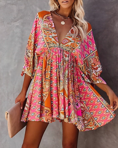 Chic V-Neck Mini Dress with Long Sleeves and Floral Print