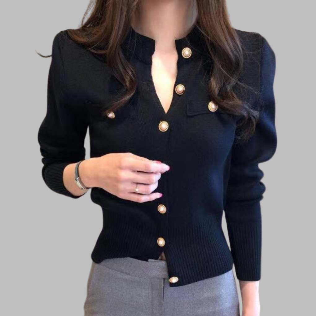 Zwarte damestrui met gouden knopen, lange mouwen en V-hals. Stijlvolle en elegante kleding voor herfst- en wintermode.