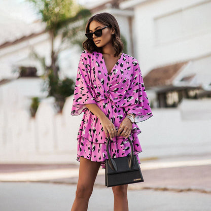 Chic Mini Dress with V Neck and Flirty Skirt