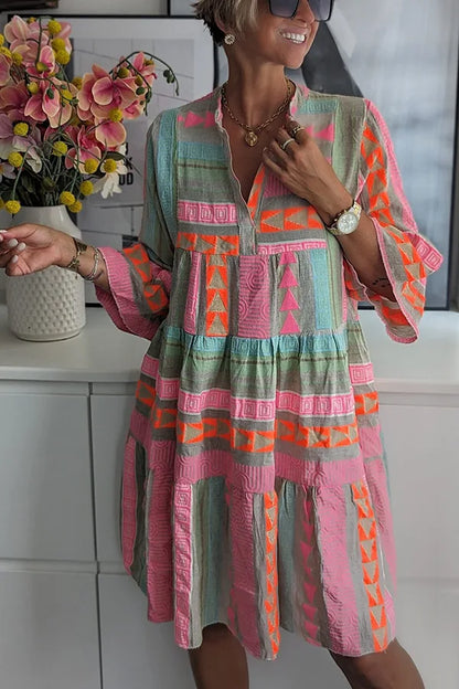 Chic Floral Mini Dress with Flared Sleeves and Ruffles