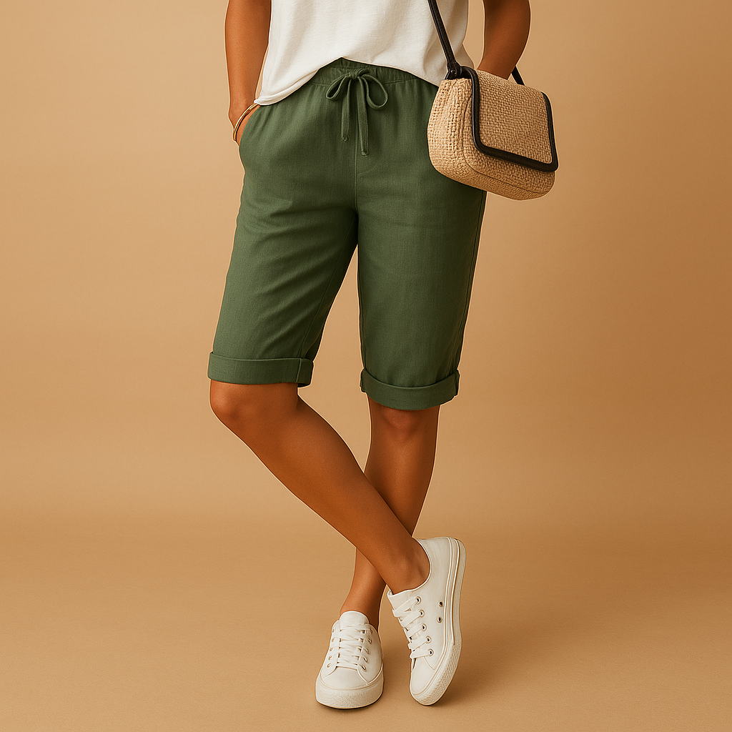 Women’s casual capri pants with elastic waistband, drawstring, and rolled hem design, perfect for spring and summer wear.