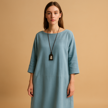 Corduroy summer dress for women named Elodie, featuring short sleeves, knee-length design, and a soft breathable texture ideal for warm casual days.
