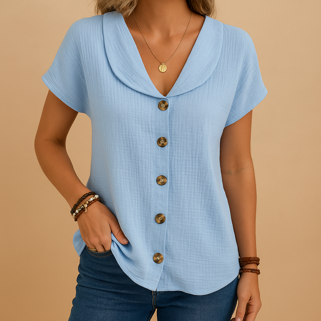Women’s elegant button-up blouse with breathable fabric and classic collar, perfect for work, casual wear, or semi-formal occasions.
