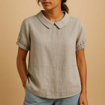 Women’s elegant fitted blouse with a classic design — perfect for office wear, formal meetings, and timeless smart-casual outfits.