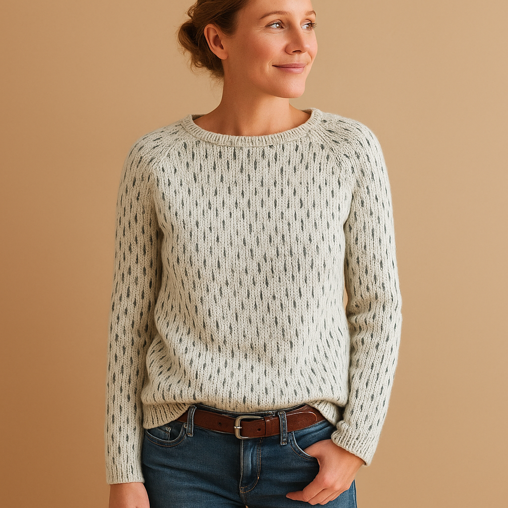 Elegant knitted winter sweater for women in breathable grey fabric with relaxed fit, perfect for layering in work, casual, or cozy outfits.
