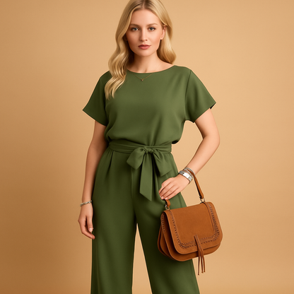 Elegant long-sleeve jumpsuit for women with tailored fit and flowy sleeves, perfect for formal occasions, galas, and evening events.