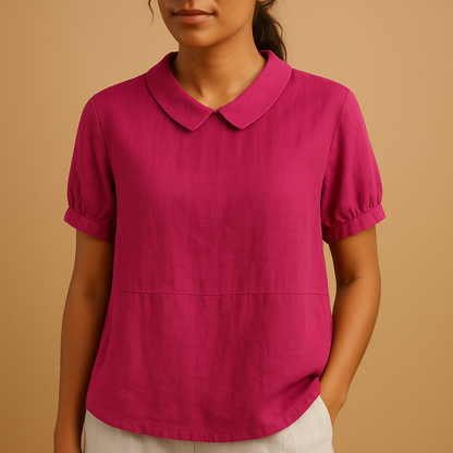 Women’s elegant tailored blouse with a classic design, suitable for office outfits, formal occasions, and smart casual looks.