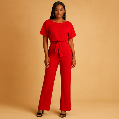 Women’s glitter halter jumpsuit with open back and flared legs, perfect for parties, galas, and festive evening occasions.