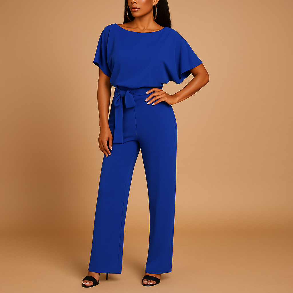 Women’s glitter halter jumpsuit with open back and flared legs, ideal for parties, galas, and elegant festive events.