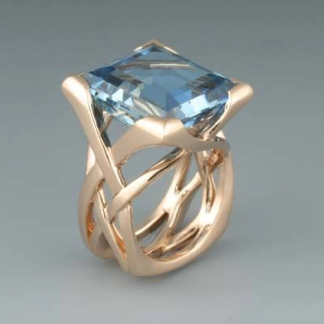 Classic Gold Ring with Blue Topaz Stone - Nocini