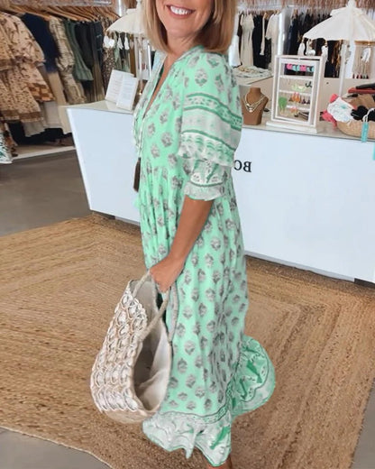 Chic Floral Midi Dress with Tassels