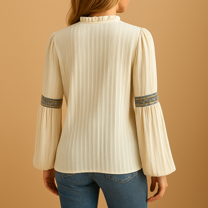 Elegant lace patchwork blouse for women with airy lantern sleeves, perfect for work, evening occasions, or stylish casual looks.