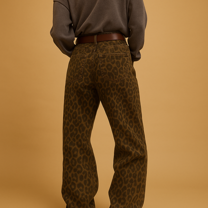 Women’s leopard print slim fit jeans with a comfortable stretch and flattering fit, perfect for casual or bold evening outfits.
