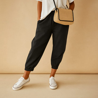 Women’s lightweight summer pants with breathable fabric and loose fit, available in beige, white, green, blue, and black. Perfect for warm days.