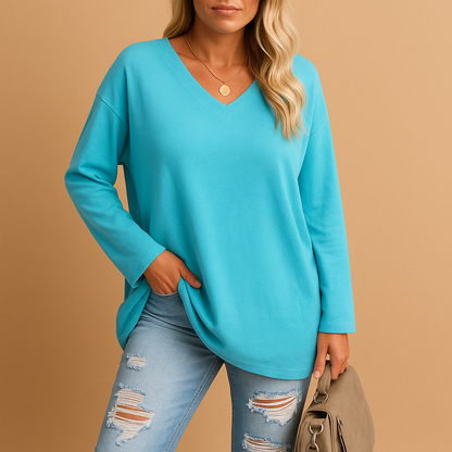 Women’s lightweight summer top with round neck and short sleeves, designed for comfort and effortless warm-weather style.