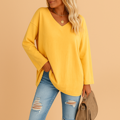 Women’s lightweight summer top with round neck and short sleeves, designed for comfort and effortless warm-weather style.
