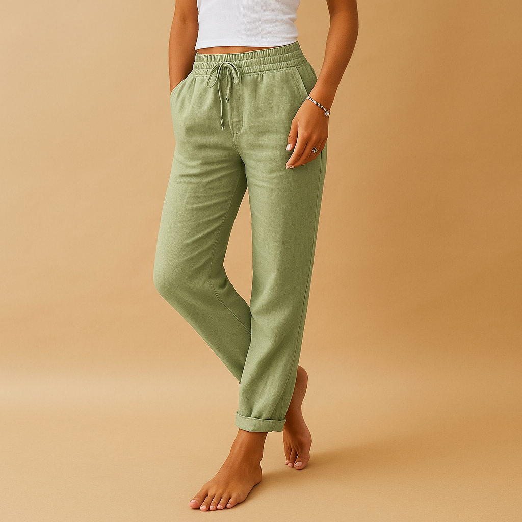 Women’s lightweight trousers with elastic waistband and feminine cut, designed with flowy fabric for casual wear or formal occasions.