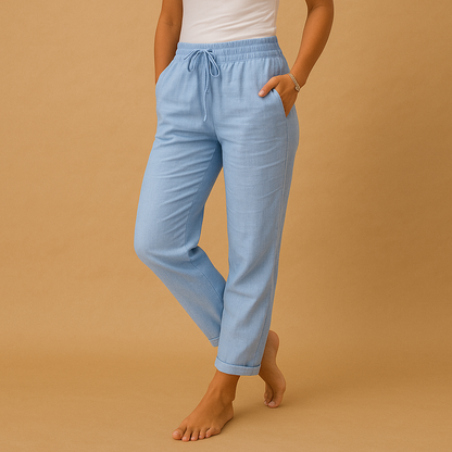 Women’s lightweight trousers with elastic waistband and feminine cut, designed with flowy fabric for casual wear or formal occasions.