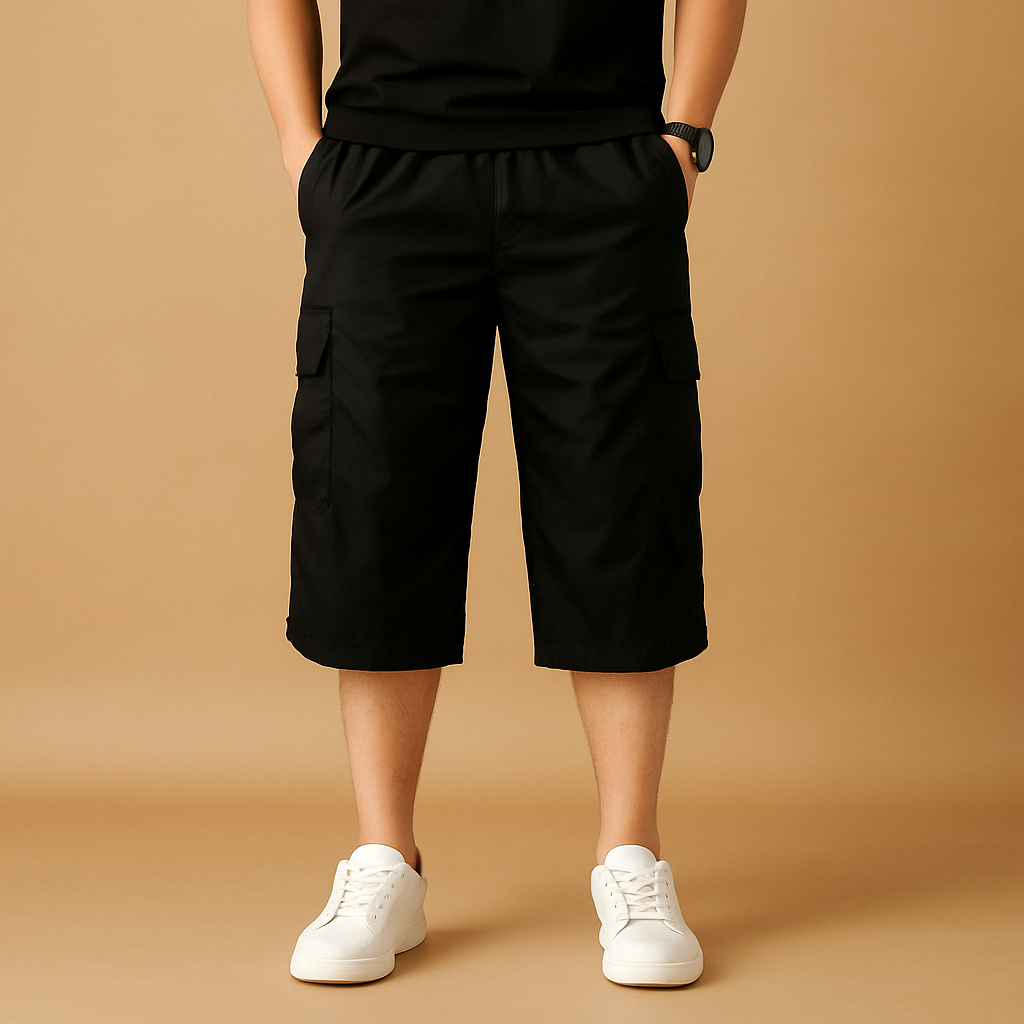 Men’s long cargo shorts with breathable cotton fabric and multiple pockets, ideal for summer, travel, and outdoor activities.