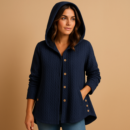 Women’s long winter coat with hood and button closure, designed for cold days, layering, and everyday city wear.