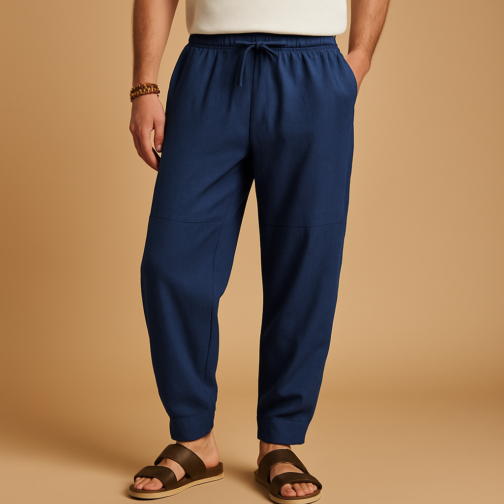 Men’s loose cotton pants with breathable fabric and relaxed fit, perfect for warm days, travel, or casual everyday wear.