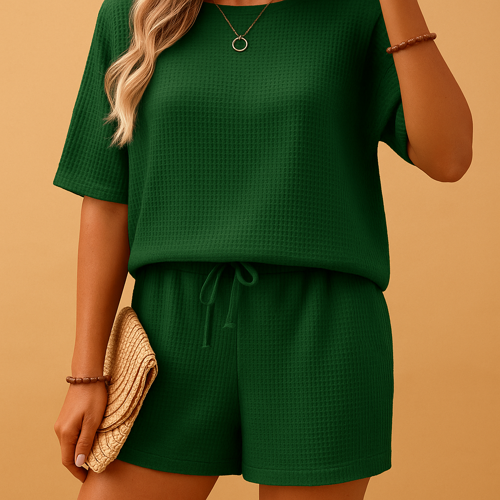 Women’s loungewear set with relaxed top and elastic shorts, perfect for home comfort, lounging, or casual summer days.