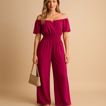 Women’s off-shoulder jumpsuit with pleated details and elastic waist, perfect for summer parties, beach walks, and casual chic occasions.