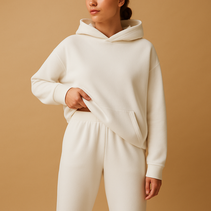Women’s oversized hoodie and jogger loungewear set in soft fabric, perfect for lounging, casual wear, or cozy evenings at home.