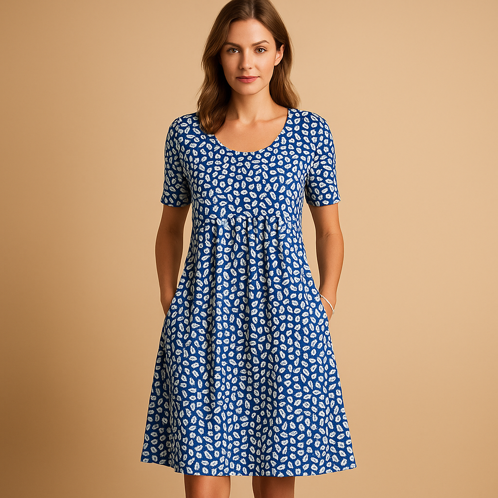 Printed cotton midi dress for women with breathable fabric and playful summer prints, perfect for vacations, city strolls, and casual wear.