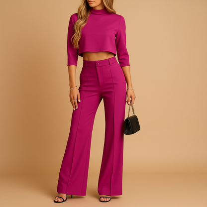 Women’s autumn two-piece set with cropped top and fitted pants, perfect for work, leisure, and stylish casual wear.