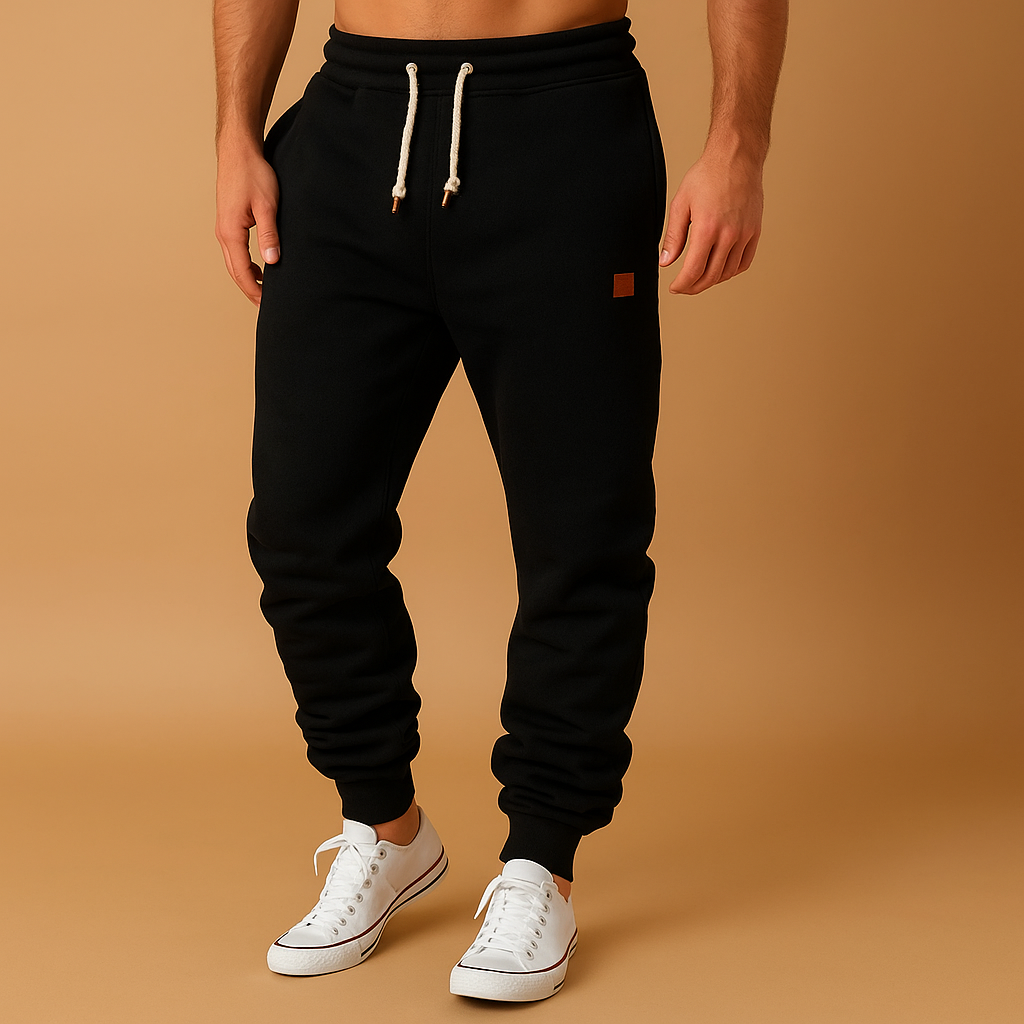 Men’s stylish jogger pants with adjustable waistband and side pockets, made from soft cotton blend for comfort and everyday wear.