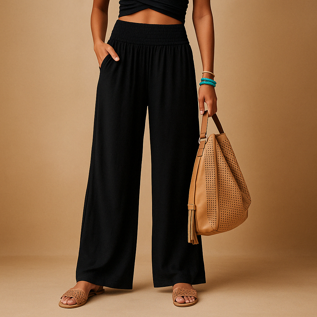 Women’s lightweight summer trousers with elastic waistband and loose straight legs, ideal for casual outings and relaxed summer days.