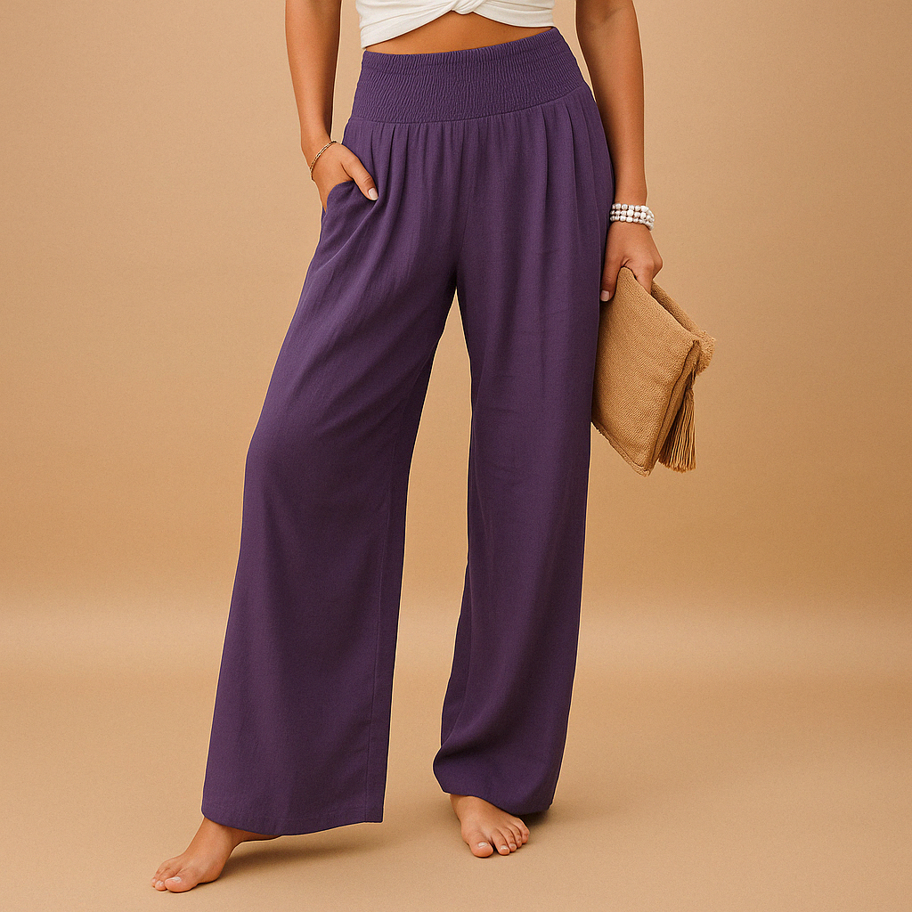 Women’s lightweight summer trousers with elastic waistband and loose straight legs, ideal for casual outings and relaxed summer days.
