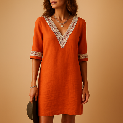 Women’s summer V-neck dress with lace accents, relaxed fit, and three-quarter sleeves. Perfect for beach outings, city strolls, and summer gatherings.