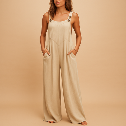 Women’s summer jumpsuit with high waist, wide legs, and button details. Lightweight and breathable design, perfect for casual or evening looks.