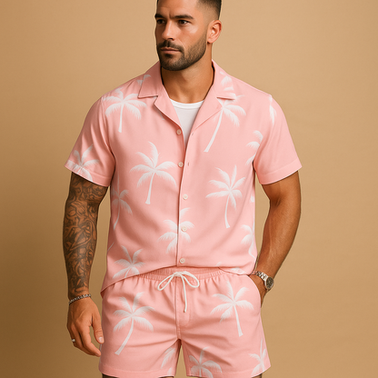 Tropical summer set for men with palm and feather print shirt and shorts, ideal for beach days, vacations, or relaxed summer outings.