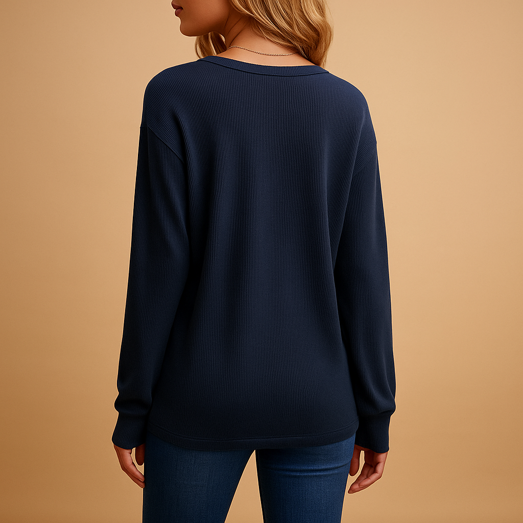 Elegant V-neck blouse for women with button details and a loose fit, perfect for daily wear and professional outfits.