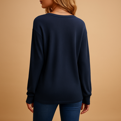 Elegant V-neck blouse for women with button details and a loose fit, perfect for daily wear and professional outfits.