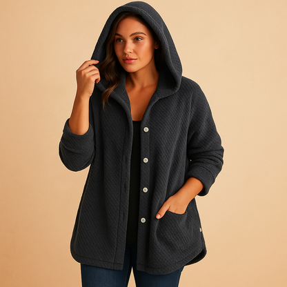 Women’s winter hooded coat with insulated lining and zip closure, suitable for cold weather, winter walks, and city trips.